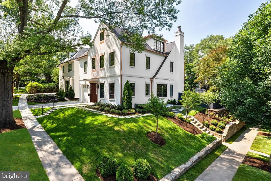 Experience elevated luxury living at 4200 49th Street NW - a newly constructed masterpiece located in the heart of Spring Valley! Built and designed by the renowned Danube Group in partnership with KAVA Holdings, GTM Architects, CMX Construction, and Studio Sophiste interior design, this exceptional residence spans approximately 5,874 square feet across four finished levels—all seamlessly connected by a private elevator. The main level showcases soaring 10-foot ceilings, a grand open-concept living and dining space, a chef’s kitchen with high-end appliances, custom finishes, a walk-in pantry, mudroom, and a private study - all of which walks out to the rear patio and garden. Upstairs, the second level features three spacious bedroom suites, including a serene primary retreat with dual walk-in closets and a spa-like bath. The third level offers a vaulted ceiling, a generous family room, and an additional private bedroom suite with charming window seating. The expansive lower level provides a fifth bedroom suite, a recreation room with wet bar, a game room, and a dedicated exercise space—ideal for entertaining or flexible living. With an attached one-car garage, driveway parking, and meticulous attention to detail throughout, this stunning home offers an unparalleled blend of elegance, functionality, and modern comfort in one of Washington’s most desirable neighborhoods. Millie's, Compass Coffee, Bluestone Lane, and Crate and Barrel are just down the street! Zoned for Mann ES, Hardy MS, MacArthur HS.