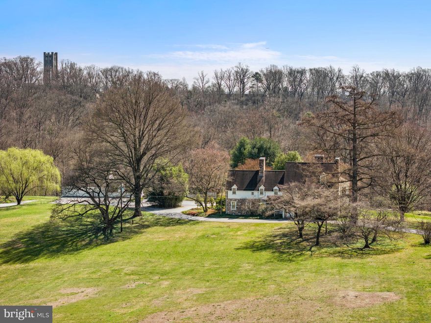 Be ready to be inspired! Crumwald Farm is an extraordinary family estate for multi-generation use, and so much more. The primary house and outbuildings are sitting on 11+ acres nestled in the Wallingford/Swarthmore community. Crumwald Farm is one of the very few residentially-zoned large open spaces left in the area. The primary home boasts living spaces that retain historic features and charm. In addition to the primary house, the property listing includes a 5 bedroom 2 bath guest house, a multi-bay detached garage, a barn with horse stables, and a swimming pool. Crumwald Farm’s location and proximity to Crum Creek and the surrounding woods provides a natural setting that is beautiful and also ecologically significant. The primary house is an exceptional example of the Colonial Revival style. It was designed and built in 1927 by R. Brognard Okie, who is regarded as one of America's preeminent domestic architects. Okie's famous design style pays homage to the colonial farmhouse architectural style and re-creates the original detail found in many southeastern Pennsylvania colonial properties. The primary house on Crumwald Farm has the hallmarks admired in Oakie-designed buildings. The home relies on well-constructed architecture of fieldstone and wood highlighted with hand-crafted decorative details. The design incorporates multiple wings, large stone chimneys, varied rooflines with a row of upstairs windows inset as wall dormers. Inside the home you will find wide, handcrafted wood plank floors, intricately detailed fireplace mantels and stair rails, hand-wrought hardware on doors and windows, and plastered walls. The interior is elegantly designed with a grand foyer and a sweeping staircase. The living room was created to impress and entertain. A magnificent fireplace with an intricately carved mantel welcomes you into the room and the six-over-nine double hung windows bring an abundance of natural light. The original old-growth hardwood floors are showstoppers, with hand-scraped edges that are set in a random width pattern throughout the house. The large classic dining room is perfect for a gracious, formal dinner or a holiday celebration. It has a wood burning fireplace and a built-in hutch with arched glass panel doors. On the main floor you will also find a cozy family room with a walk-in hearth reminiscent of the old colonial kitchens. This room has built-in bookcases lining one wall, perfect to showcase your family photos, collectibles, favorite books, and treasures. Off the family room is an ample and welcoming enclosed porch overlooking the extensive grounds. The large kitchen space is ready to be transformed into a fabulous gourmet kitchen. The upper floors of the main house have a total of seven bedrooms, six full baths, and a delightful sun parlor. At the back of the house a perfectly positioned stone patio provides the ideal place for outdoor entertainment. Throughout the house and at every turn, you will experience the quality of a handbuilt home from an earlier time. Okie paid particular attention to the selection of the site where he placed his buildings. He studied and admired the judgment and artistic sense that early builders used in placing homes and out-buildings. He would look for the natural way buildings would fit the ground and make sure that its proportions were appropriate for the setting. The placement of each door and window was done with this in mind. Crumwald Farm provides many dramatic features in the landscape, with towering trees, distant views and rhythmic planting that draws the eye. The location of the Crumwald house is a testament to Okie's appreciation of building a home that is suitable to its surroundings. The house is uniquely preserved and ready to be transformed by a new owner who admires exceptional craftsmanship. A deed restriction limits the subdivision of this property to no more than two parcels.