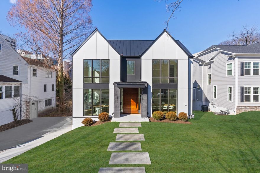 Set in the Town of Chevy Chase, MD, 4405 Elm Street is a newly built home by Corebuild+ and designed by GTM Architects, offering an unparalleled blend of elegance, functionality, and modern luxury. Boasting 6 Bedrooms, 6.5 Bathrooms, and approximately 6,900 total SF across 4 thoughtfully designed levels, serviced by an elevator for ultimate convenience. The Main Level welcomes you through a covered porch into a grand Foyer, flanked by a private Study and a Formal Dining Room. The Dining Room seamlessly connects to the Gourmet Kitchen through a well-appointed Pantry and Wet Bar, creating a perfect flow for entertaining. Anchored by a Gas Fireplace, the Great Room sits across from the Gourmet Kitchen with Dekton Countertops, Miele and Bertazzoni appliances, and Breakfast Area, offering a warm and inviting atmosphere, providing easy access to a covered rear Deck with gas fireplace, expanding the indoor-outdoor living experience. A Powder Room and a coat closet complete this level’s offerings. The Second Level is home to the luxurious Primary Suite, complete with a spa-like Bathroom, a large walk-in closet, and a private outdoor retreat. Three additional Bedroom Suites, and a well-appointed Laundry Room, ensure both comfort and convenience for family and guests alike. The Third Level offers a flexible and stylish retreat, featuring a 5th Bedroom Suite, a Storage Room, and a Lounge Area with a Wet Bar, and access to a spacious Roofdeck. Designed for ultimate versatility, the Lower Level boasts a multifunctional Recreation Room with a Wet Bar, a 6th Bedroom, a Hall Bathroom, and direct access to the attached 2-car Garage, providing ample space for both day-to-day living and leisurely activities. With its sophisticated design, luxurious finishes, and prime location, 4405 Elm St, offers an extraordinary opportunity to experience refined living at its finest, only minutes away from Bethesda and Washington, DC. The property is conveniently located next to Leland Neighborhood Park, Lawton Rec Center, Elm Street Park, Downtown Bethesda shops and restaurants, and more! Zoned for Chevy Chase ES, Silver Creek MS, and Bethesda-Chevy Chase HS.