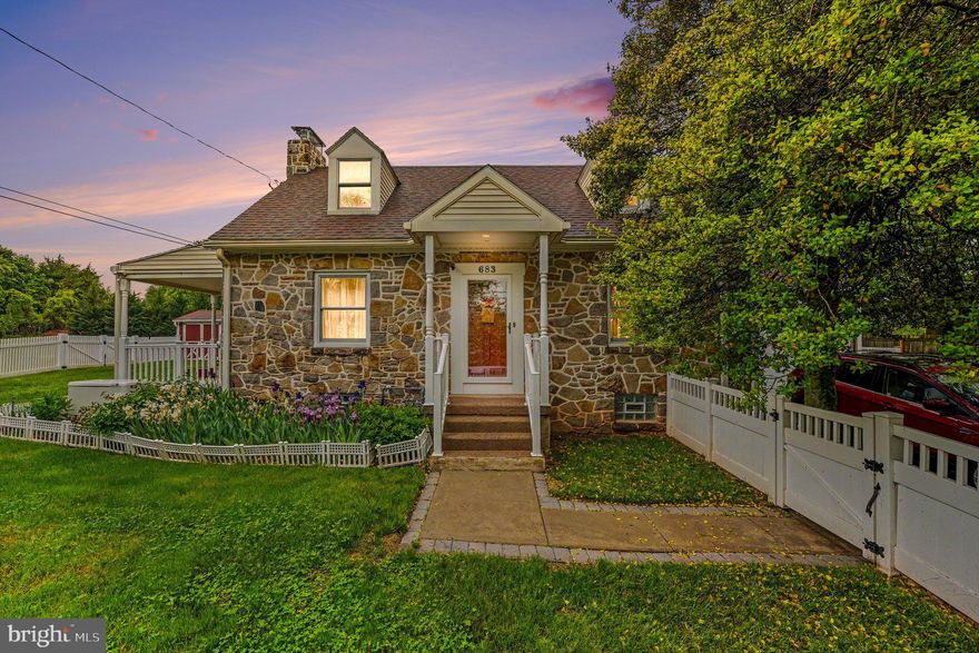 Welcome to 683 Ridge Road, a charming Cape Cod–style home built in 1939 and beautifully crafted with timeless Pennsylvania fieldstone. Lovingly maintained over the years, this residence blends classic character with thoughtful updates, creating a warm and inviting place to call home. All while being located within the highly sought-after Owen J. Roberts School District. Step inside to discover a spacious living room featuring carpeting, a stunning stone fireplace as its focal point, and access to a covered side patio—perfect for relaxing or entertaining. The adjoining dining room showcases hardwood flooring and flows seamlessly into the kitchen, where you’ll find crisp white cabinetry, stainless steel appliances, electric cooking, a dishwasher, and a charming dual-basin farmhouse sink. Just off the kitchen, a second covered deck with a ceiling fan provides a comfortable outdoor space and convenient access to the attached garage. The well-maintained yard is partially fenced which is ideal for pet owners and features a large shed offering additional storage or versatility. Upstairs, two generously sized bedrooms are filled with natural light and offer ample closet space, along with a shared full bathroom. A versatile bonus room on this level is perfect for a home office, nursery, or playroom. One of the bedrooms also features access to attic storage above the garage. The basement level includes laundry with a washer, dryer, and utility sink, along with key home systems such as the furnace, water softener and conditioner, well pump, UV light system, and a backup generator which is included in the sale. A large storage room provides even more space for organization. Additional highlights include mini-split systems throughout the home for added comfort,  and ample parking with a paved driveway and attached one car garage. This delightful home offers character, comfort, and practicality in one inviting package—schedule your tour today to soon call this house your home!
