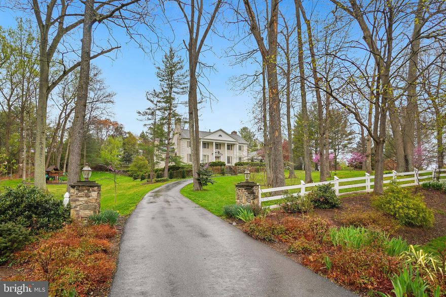 **Accepting offers until August 1** This all-brick stately Georgian Colonial exemplifies pure elegance from the moment you pull into the large circular driveway.  Situated atop the most coveted 2 acre lot in the exclusive Lake Potomac community, this 1987-built 5 bedroom/4 bathroom/2 half bath home with  6 fireplaces and 3 car garage is truly a rare find! Beautiful crown molding and gleaming hardwood floors flow throughout the main and  upper levels.  Expansive sunlit gourmet kitchen opens to family room with floor to  ceiling stone wood-burning fireplace, floor to ceiling windows and a French door leading to the oversized  deck in the private  backyard. Sophisticated living room and dining room, each complete with walls of windows and a marble surround fireplace.  Main floor also highlights a home office with built- ins and glass  French pocket doors, a powder room and mudroom with built-ins, a doggy spa/shower and access to both the backyard and the side entry 3 car garage.  As you ascend the stunning curved staircase,  you’ll arrive at the  owner’s suite, encompassing an expansive owner’s bath, walk-in closet, dressing area and large bedroom with a wood- burning fireplace.  Down the hall you’ll find a laundry room, a hall bathroom and 3 generous  secondary bedrooms, one with an en-suite bathroom.  Amazingly redesigned and recently refinished with 2027 sq ft of additional living space, the walk-out lower level features an elegant landing opening to an  enormous space, featuring a recreation area, 2 fireplaces, a powder room, a fabulous guest suite with a  stylish en-suite bathroom, walk-in closet and separate access to the back patio.  Breathtaking private lot with fabulous flagstone paths and patio,  a large Trek deck and front and rear stone retaining  walls creating a consistent and stunning architectural feature. Beautiful landscaping and spectacular  exterior lighting and house accent lighting.   The house has an Invisible Fence installed around the entire property for pets.   All new window and doors by Thomson Creek (except two in the  back). Light switch dimmers throughout.   Drainage system in place.  A MUST SEE!!!!