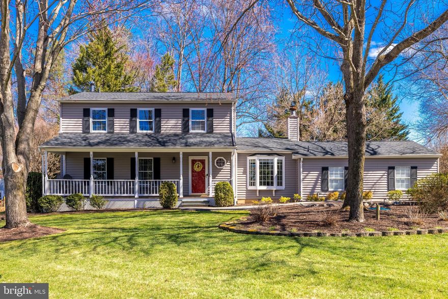 Welcome to 12512 Glenbrooke Woods Drive in the sought after Oak Hill area with highly rated Crossfield/Carson/Oakton pyramid schools and an unbeatable location.  This beautifully maintained 4-bedroom, 2.5-bathroom gem is updated with over 2,600 square feet of finished living space. Nestled on an impressive .41 acre lot, this home offers privacy and natural beauty, surrounded by majestic trees and an expansive backyard that invites you to unwind and enjoy.  Upon arrival, you're greeted by a paver walkway leading to a charming front porch and picturesque front yard. Inside, stunning oak hardwood floors, in excellent condition, set the stage for a formal living area with a cozy gas fireplace, perfect for those chilly evenings and extra-large dining room ready for your next dinner party.   The chef’s kitchen is a dream, featuring ample counter space, cabinetry, and a spacious island with seating. Stainless steel appliances, including a double oven, make meal prep a breeze. The kitchen opens to a grand room with vaulted ceilings, drenched in natural light and offering serene views of the stunning backyard.  Upstairs, the retreat continues with four bedrooms, including a primary suite with a fully renovated ensuite boasting on-trend finishes. The three secondary bedrooms offer ample closet space and share a tastefully renovated hall bath.  The lower level provides a large recreation room, a spacious laundry area, and plenty of unfinished storage space. Step outside to the expansive deck, where the extensive yard, surrounding trees and privacy fence make for an unbeatable outdoor setting—perfect for entertaining or simply relaxing. Don't miss the oversized garage with tons of additional storage as well as extended driveway providing tons of added parking.  New roof and family room casement windows.  Newer paint and kitchen appliances.  Replaced windows and siding.  All this plus easy access to major commuter routes and metro and shopping/dining minutes away.