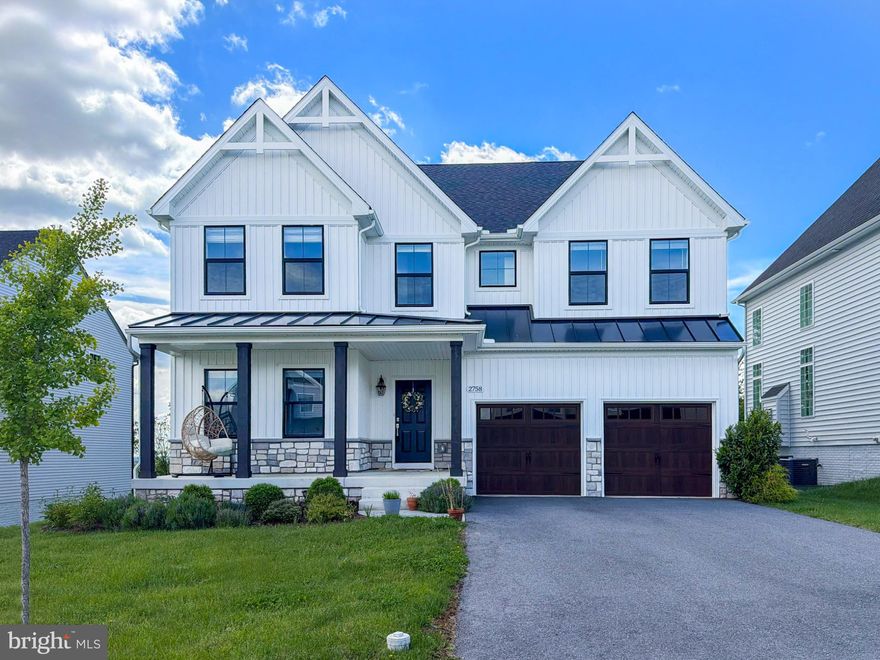 This stunning home, less than three years young, blends modern design with everyday luxury. The open-concept layout showcases a chef’s kitchen featuring quartz countertops, stainless steel appliances, double ovens, and an oversized pantry—perfect for entertaining and daily living.

Scratch-proof hardwood floors flow throughout the main living areas, leading to a cozy stone gas fireplace that anchors the spacious family room. Just off the kitchen, enjoy a convenient office nook ideal for working from home or managing daily tasks.

The luxurious primary suite boasts a spa-like master bathroom designed for relaxation and comfort. Backing to mature trees, the home offers exceptional privacy and peaceful views year-round.

Thoughtfully designed with high-end finishes and functional spaces, this nearly new home is truly move-in ready and made for modern living.