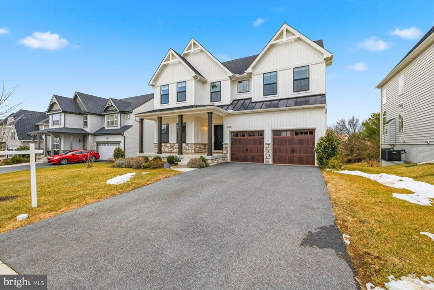 This stunning home, less than three years young, blends modern design with everyday luxury. The open-concept layout showcases a chef’s kitchen featuring quartz countertops, stainless steel appliances, double ovens, and an oversized pantry—perfect for entertaining and daily living.

Scratch-proof hardwood floors flow throughout the main living areas, leading to a cozy stone gas fireplace that anchors the spacious family room. Just off the kitchen, enjoy a convenient office nook ideal for working from home or managing daily tasks.

The luxurious primary suite boasts a spa-like master bathroom designed for relaxation and comfort. Backing to mature trees, the home offers exceptional privacy and peaceful views year-round.

Thoughtfully designed with high-end finishes and functional spaces, this nearly new home is truly move-in ready and made for modern living.