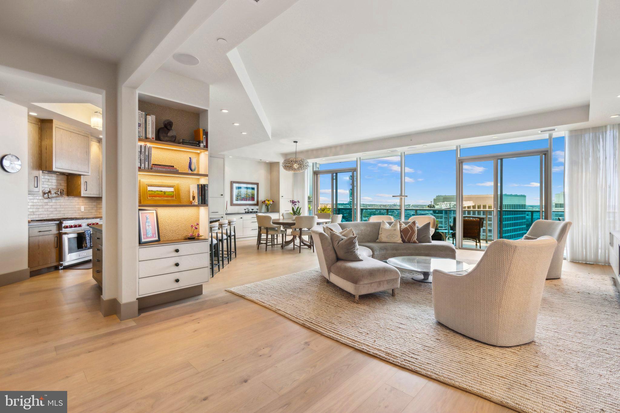 LOCATION l LOCATION l LOCATION
WELCOME TO ELEVATED LIVING IN THE MOST SOUGHT AFTER 5 STAR RESIDENCES IN THE CAPITOL REGION! TURNBERRY TOWER DELIVERS UNMATCHED LUXURY WITH 24-HOUR VALET, SECURITY, CONCIERGE, ALL SEASON POOL, MOVIE THEATER, STATE OF THE ART HEALTH CLUB WITH YOGA STUDIO AND COMMUNITY ROOM. THIS SPECTACULAR 3 BEDROOM, 3.5 BATH RESIDENCE WITH PRIVATE ELEVATOR ON THE 23RD FLOOR OFFERS APPROX $300K+ OF STUNNING BESPOKE FINISHES THROUGHOUT. FEATURES INCLUDE RENOVATED GOURMET KITCHEN, WOLF 6-BURNER GAS STOVE, SUB ZERO WITH CUSTOM CABINETRY AND COUNTERTOPS, CUSTOM BUILT INS AND DESIGNER LIGHTING THROUGHOUT. GENEROUS RENOVATED LAUNDRY ROOM WITH AMPLE STORAGE, DESIGNER ACCENT ELECTRIC FIREPLACES IN LIVING ROOM AND PRIMARTY SUITE. LOVELY CUSTOM TILED TERRACE TO ENJOY SWEEPING VIEWS OF DC SKYLINE AND THE KENNEDY CENTER AND MORNING SUNRISES. 2 CAR PARKING AND 2 SPACIOUS STORAGE ROOMS COMPLETE THIS SPECIAL OFFERING. STEPS TO THE ROSSLYN METRO AND STEPS TO BIKE/JOGGING PATH ALONG THE POTOMAC, EASY ACCESS TO GEORGETOWN, GU, GW, NATIONAL MALL, MUSEUMS, KENNEDY CENTER. QUICK ACCESS TO RONALD REAGAN NATIONAL/DCA.
OPEN HOUSE SUNDAY, MAY 25TH 1-4