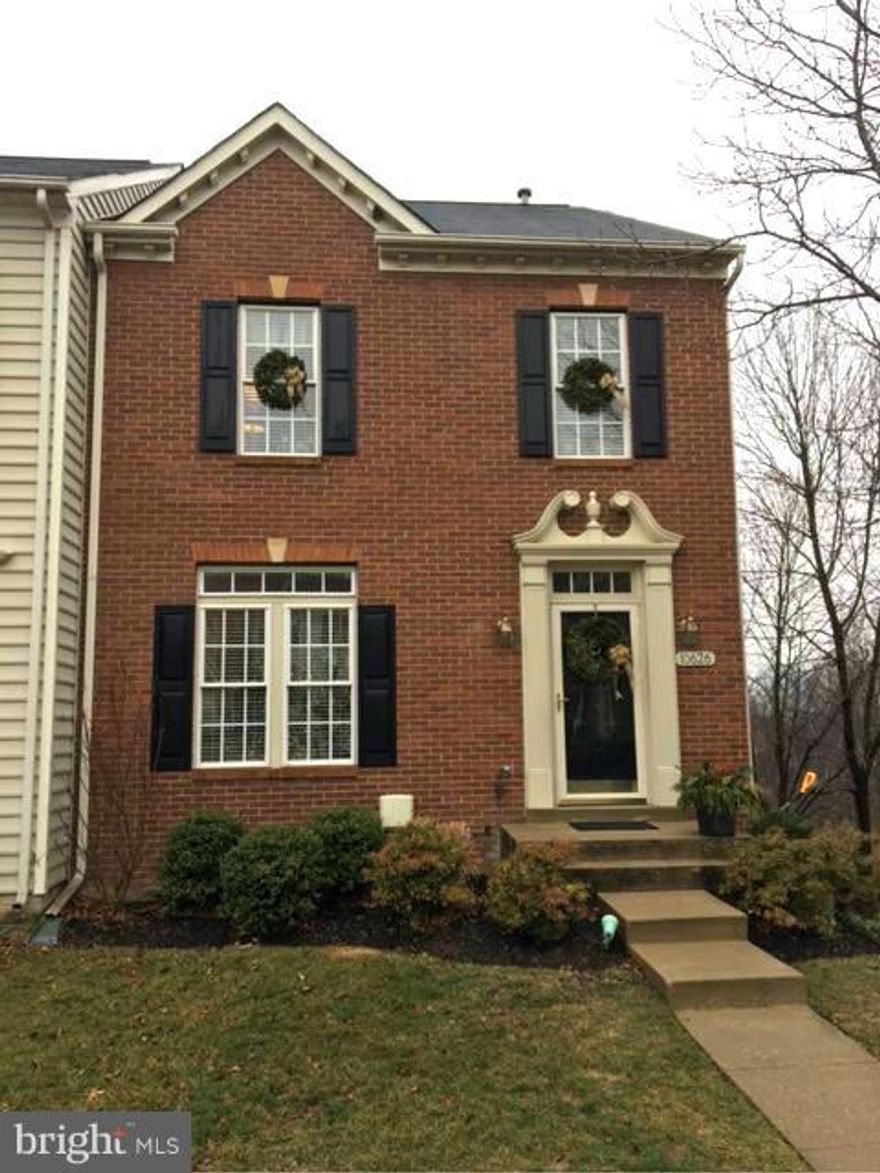 Large EOG townhouse in highly desirable Waverly Woods. 4BR/3.5BA. Open main level w/ tons of natural light & hardwood floors. Gas fireplace. Beautiful open kitchen w/ island & dining space w/ built-ins. Large deck off kitchen. Fully finished basement w/ BR & FB. Basement walk out to yard that backs to wooded area for private setting. Large attic for extra storage. New HVAC, H2O heater & disposal.