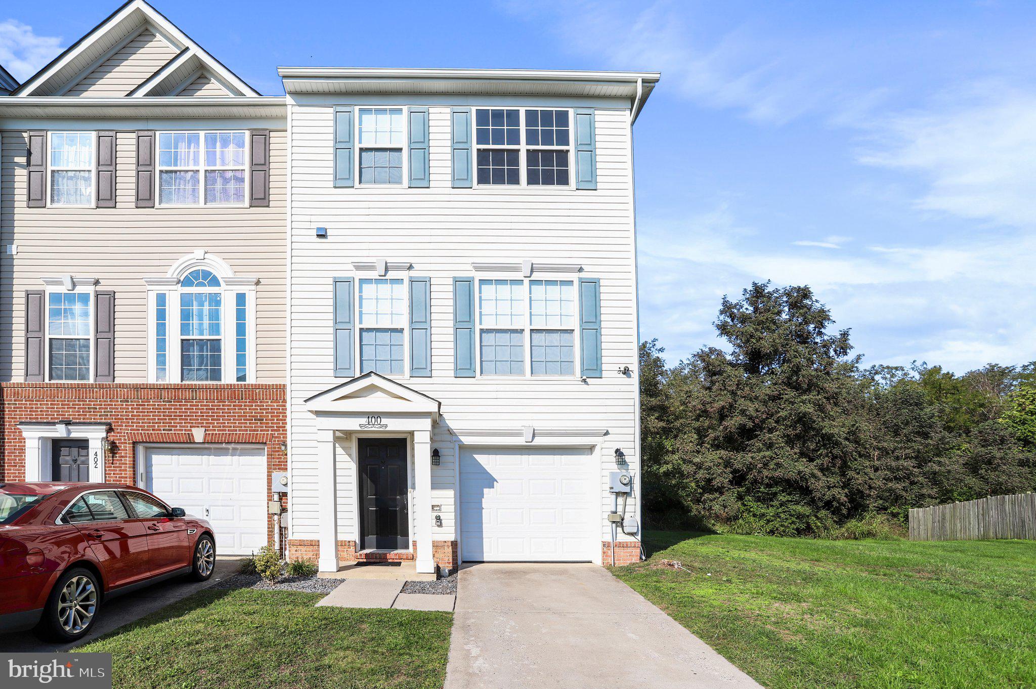 Desirable end-unit townhouse in perfect commuter's location, just minutes to I-81 and many shops and restaurants. This spacious floor plan has room for everyone with a 3 level bump out. The first level consists of a walk-out basement that houses the laundry room, a half bath and two flex spaces that can be used for a den, office, gym or even a fourth bedroom. The second level features a light and bright living room , half bath and eat-in-kitchen with a peninsula and pantry. The top floor has two sizeable secondary bathrooms that share a hall bath. The master bedroom is a true oasis, with large walk-in-closet and attached bath complete with dual sinks, separate shower and soaker tub. Backs to trees which offers tons of privacy.