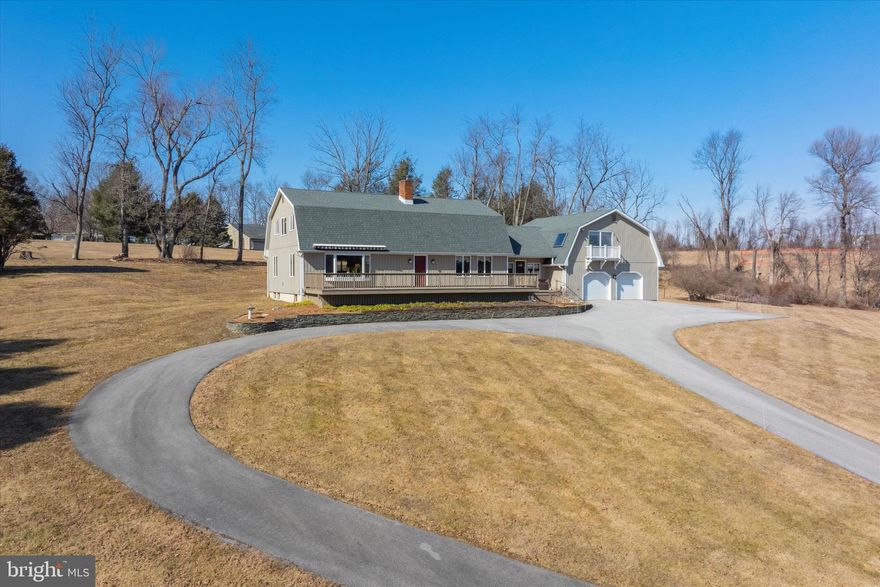 181 Hadfield Road is a custom-built Dutch Colonial home with over 3,000+ square feet of living space, an in-law suite/separate living quarters, attached 2-car garage, and a detached 1.5 car garage/utility building.  Situated on 5.7 ACRES of land in bucolic East Brandywine Township, this property has all of the space and privacy you’ve been looking for.  Surrounded by large estates, the land has beautiful vistas in all directions, that are visible from every window in the house.   The home was thoughtfully designed with a large family in mind, and was solidly built with 2x6 construction.  You’ll appreciate the rustic wood beams throughout the main floor, a beautiful design feature that you won’t find in a cookie-cutter residence.   Recent ultra-valuable upgrades include: New Roof (2019), New Main-Floor Zone HVAC (2019), New Hot Water Heater (2023), and a Generac XT8000E Generator that’s included with the home.  The main floor boasts a desirable open layout, with many windows for plentiful sunlight and enjoyable views.  A large deck spans the front of the home, with a retractable awning, perfect for dining al-fresco while watching the sunset. 
 There are 2 bedrooms and a full bathroom on the main floor for convenience.   Connecting the main house to the oversized garage & apartment is a breezeway/mudroom where you’ll find the laundry area and a convenient half bath too.  Upstairs, you will find 2 oversized bedrooms, and a full bathroom with double vanity, walk-in shower, and soaking tub.  Above the garage is a rare feature: A separate living quarters! This 1 bedroom and 1 full bath apartment has a kitchen & living room with a view…it can accommodate family, guests, a caretaker, a teen retreat, or simply use it as a private office.  Lastly, there is a large unfinished basement with great potential to be finished into additional living space! This property will support the lifestyle you’ve been craving - More privacy, surrounded by nature, where home is your haven.  Plenty of space for a hobby garden or farm, and everything in between.  Efficient and sustainable utilities include: private well water, gravity fed septic system, 2-zone electric HVAC, and 2 wood stoves for adaptable heating. Showings begin Friday, 2/28 at 12pm...this is a must-see uniquely beautiful property!
