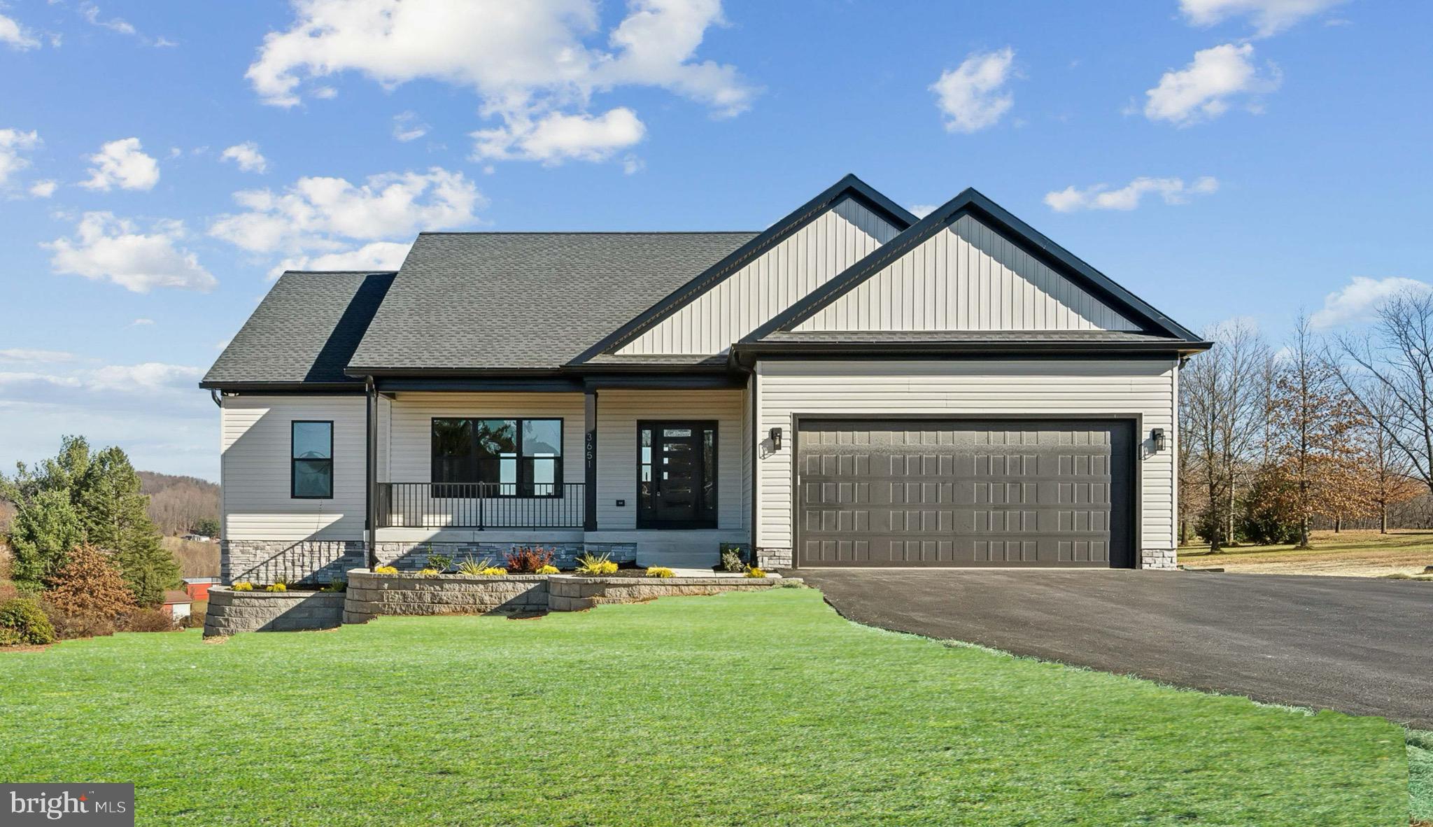 Step into distinction with this custom-built estate by Lenis Homes, masterfully crafted and perfectly positioned on nearly 2 private acres. This home commands attention with its striking blend of modern architecture, natural tones, and a moody yet inviting ambiance—a space that speaks to refined taste and comfort.
From the moment you enter, you're greeted by a seamless open design, enriched with wide-plank hardwood floors, porcelain tile, and high quality finishes throughout. Every element has been thoughtfully curated for both luxury and functionality.
Main-level living is effortless with spacious bedrooms, full laundry, and a stunning primary suite that redefines retreat: an expansive walk-in closet, spa-inspired bathroom with a soaking tub, and an oversized walk-in shower with multiple water features.
A mudroom off the oversized two-car garage offers everyday convenience, while the roughed-in basement—already insulated—invites your personal touch.
Energy efficiency meets modern intelligence with high-efficiency appliances, a tankless water heater, dual-fuel HVAC, and fully integrated SMART home technology—including automated lighting and a whole-home water safety system. Plus, enjoy the savings and flexibility of an owned propane tank with monitoring system.
Outdoors, enjoy treetop views, a tranquil backyard, and privacy-enhancing arborvitae trees thoughtfully planted along the front and side—laying the foundation for your future outdoor oasis.
This home isn’t just built—it’s strategically designed to impress, inspire, and endure. Schedule your visit soon! Virtual tours available.