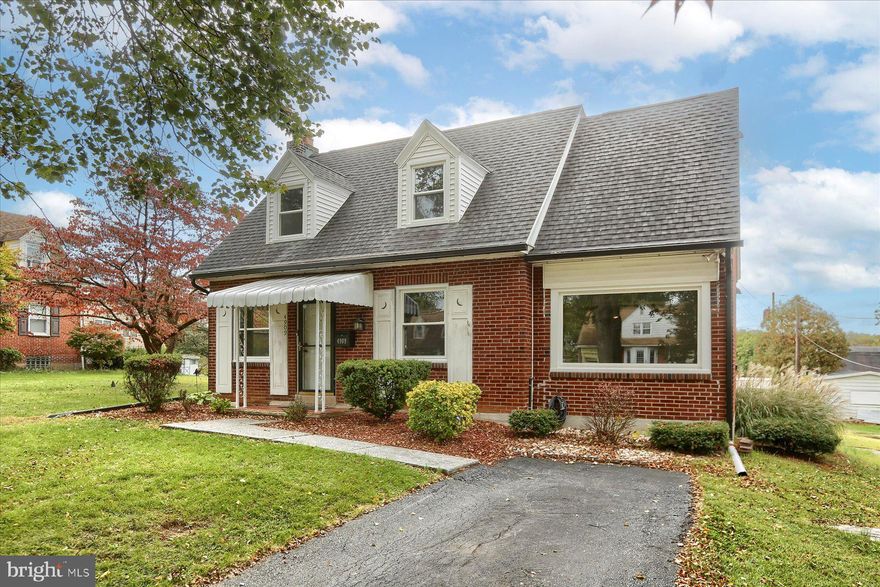 Beautifully updated 4 bedroom 2 full bath cape cod home on tree lined street waiting for its new family. First floor owners Suite with full bath and walk in closet. Remodeled kitchen, Granite and SS Appliances. HW Floors, new central air, Wood burning fireplace. Mudroom with built-ins. Covered patio for back yard BBQ. Paved driveway in front of home with detached carport in the rear of the home. Garage was converted to commercial kitchen.