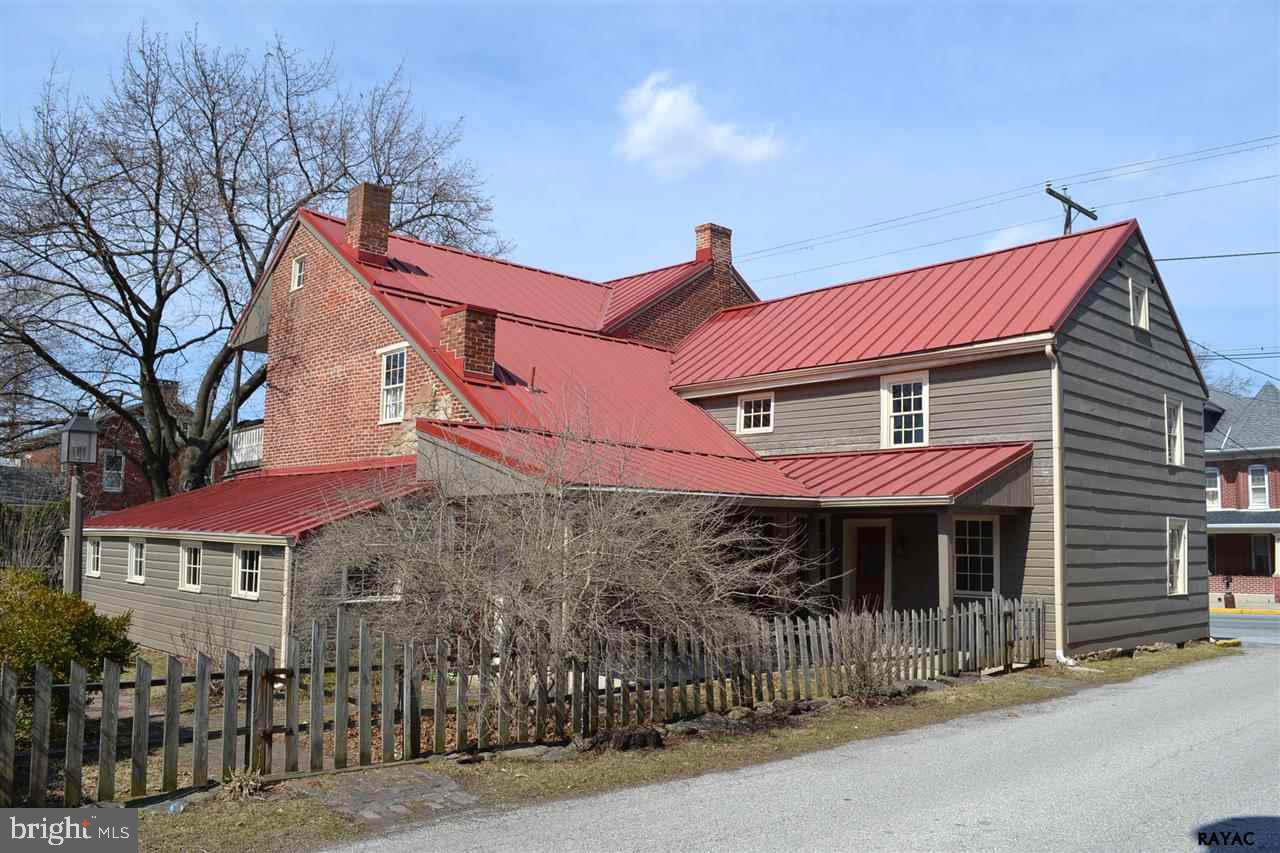 Key 1790"s home in Registered Historical District. The Studebaker House, Zoned Residential, Village Trade. Great business use potential. Convenient to Restaurants, Post Office, Banks, Medical Offices, Churches, Fitness Center and New Community Park. Four Bedrooms, 3.5 Baths, recently upgrades include heating, cooling, electrical, and plumbing. A must see!
