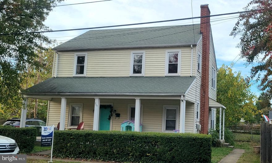 This 1930 Colonial home in downtown Fredericksburg has so much to offer!! The home is currently zoned Commercial/Transitional Office, but has so many possibilities. The unfinished basement has dual gas furnaces, 2 electrical panels, 2 hot water heaters for the 2 rental properties that the home currently is being used for. The main floor offers 2 bedrooms, living room, dining room, 1 full bath and kitchen.  The outdoor space is a large concrete front porch and the backyard is fully fenced for the main level residence.  The 2nd apartment on the top floor has recently been remodeled and offers 2 bedrooms, living room, 1 full bath and a cute eat in kitchen! Off of the kitchen there are stairs to the attic space which is ready for someone to make into another bedroom, play area, or office! The upstairs apartment also offers a fenced in backyard.  Verizon Fios is available for those working from home. Walk the canal path, downtown shops, fine dining or check out the river; everything is close! Less than a mile you can be on the VRE headed to Washington DC. Perfect location and so much potential, HOME IS BEING SOLD AS IS, check this home out today!!!