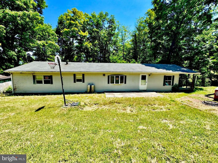 "Rt. 50 Fixer-Upper" Double-Wide on 1.6 flat +/- ACRES just off Rt. 50 outside Gormania, WV. Multiple outbuildings and gravel driveway/ parking area. Mature timber surrounds the home. Home sold AS-IS!