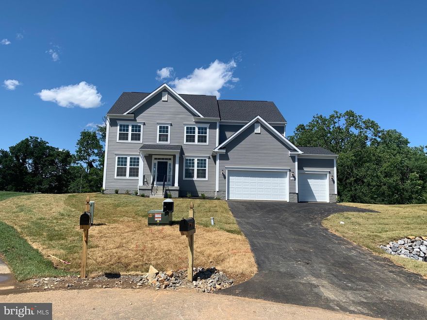 COMP: Castlerock MODEL Elevation 1 4' Rear Extension, Gas Fireplace, 3 Car Garage.09-20-2018 Original CONTRACT DATE