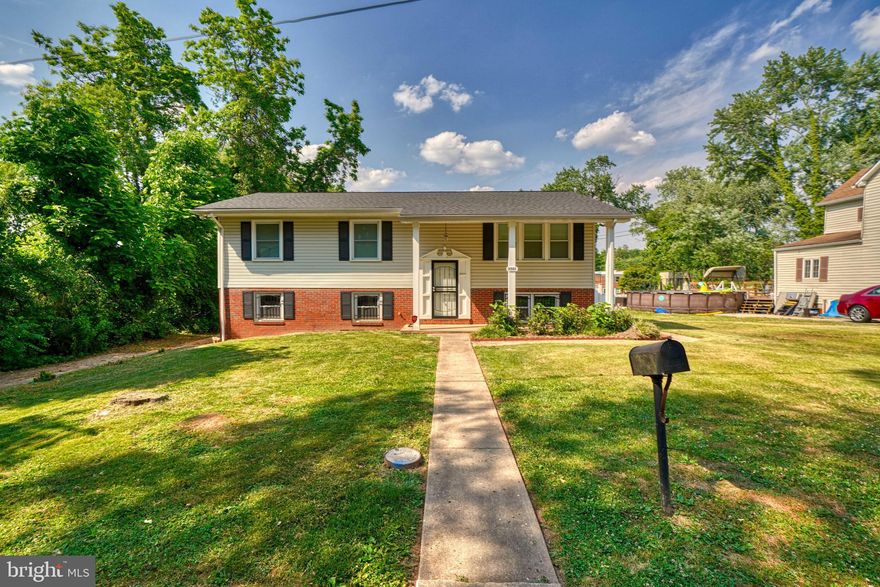 Wonderful renovated 4 bedroom, 2.5 bath split foyer home ready for move-in NOW! Make this your new DREAM HOME! Home features wood floors, gourmet kitchen, lots of space, 4 bedrooms, 2.5 baths, finished basement with wet bar, end of street, large fenced in rear yard, fire pit, deck, the list goes on! Main level has wood floors, gourmet kitchen, living room, dining room area that leads to a rear deck, 2 good sized bedrooms and 1.5 baths. Lower level has 2 bedrooms, 1 full bath, large recreational room with wet bar, unfinished area with washer/dryer. Exterior features driveway, large fenced in rear yard, fire pit and shed. The only thing missing is YOU! Pictures are from 2 years ago.