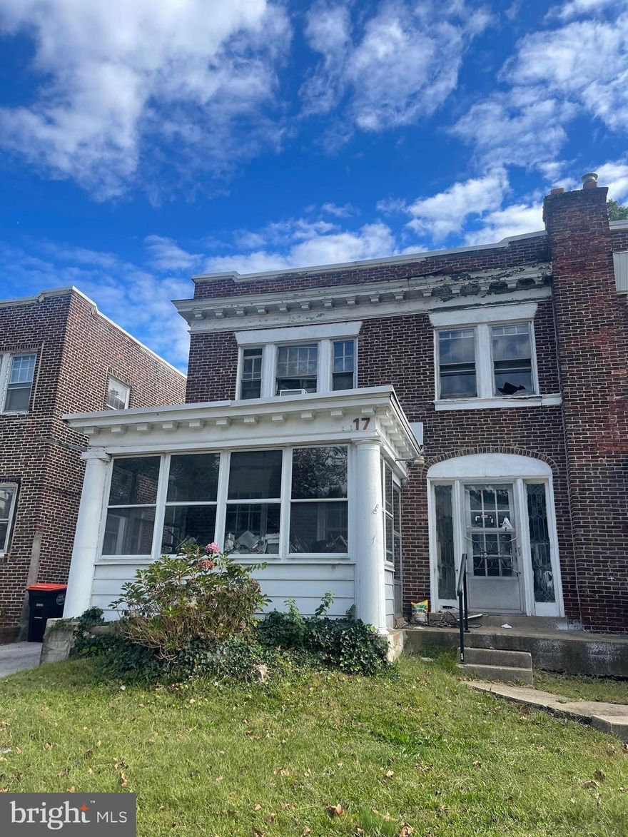 Investor Alert!!  2 Unit brick twin with off street driveway parking, enclosed front porch, front and rear yards.    Total Hoarder house but will be a great income generator after cleanout and renovation.  Sold in as-is condition.