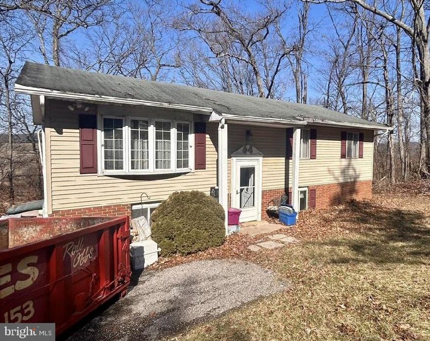 Investor Alert!  Fixer upper opportunity! Bring your vision and tools! This split foyer is situated on a .65 acre lot.  The home features traditional split level layout with living room, dining room, kitchen and bedrooms.  Finished lower level with rough in bath ready for your updates and improvements.  Whether youre an investor looking for your next flip or a buyer who is handy and wants to build equity, this property is full of potential. Property has been winterized as is being sold as-is.