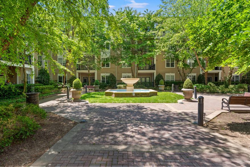 Welcome to effortless living at The Fitz—where comfort, convenience, and location come together in one beautifully refreshed residence in the heart of Rockville! This move-in ready two-bedroom, two-bath condo stands out from the competition with MAIN-LEVEL ENTRY with covered garage access just steps away. Whether you’re carrying groceries, walking the dog, commuting daily, downsizing, or simply seeking easier everyday living, this layout offers unmatched accessibility and convenience that buyers crave.
Freshly updated with NEW paint, NEW carpet, and a NEW refrigerator, the home offers a crisp, modern feel from the moment you enter. The stylish kitchen features 42” white cabinetry, granite countertops, stainless steel appliances, gas cooking, and opens seamlessly to the living and dining areas complete with hardwood floors, soaring 9-foot ceilings, elegant crown molding, and a cozy corner gas fireplace. A private balcony overlooking a peaceful, landscaped courtyard is your own quiet retreat in the center of it all.  Additional highlights include a separate laundry room, TWO separately deeded garage PARKING SPACES, and an oversized climate-controlled storage room—rare extras that elevate both comfort and practicality. Major system updates include HVAC (2023), washer (2024), and dryer (2022), offering added peace of mind for years to come.
Residents of this gated community enjoy onsite management and amenities including a fitness center, pool, billiards room, and theater room. And the location simply cannot be beat—within walking distance to vibrant Rockville Town Center offering an array of dining, shopping and entertainment, Rockville Metro, MARC Train, bus routes, and everyday grocery, pharmacy and banking needs.  Easy access to Montgomery College and major commuter routes also makes this an exceptional opportunity for professionals or students.  Turn-key, exceptionally located, and designed for easy living—this is the one to call home!