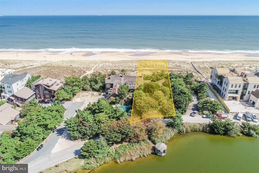 Oceanfront at its very best! Just under a half acre building lot fronting both the Atlantic Ocean and Silver Lake situated on East Lake Drive, the most desired location along the Delaware coast. Enjoy serene views while being just a short bike ride to the shops and restaurants that line Rehoboth Avenue. Rare opportunity.