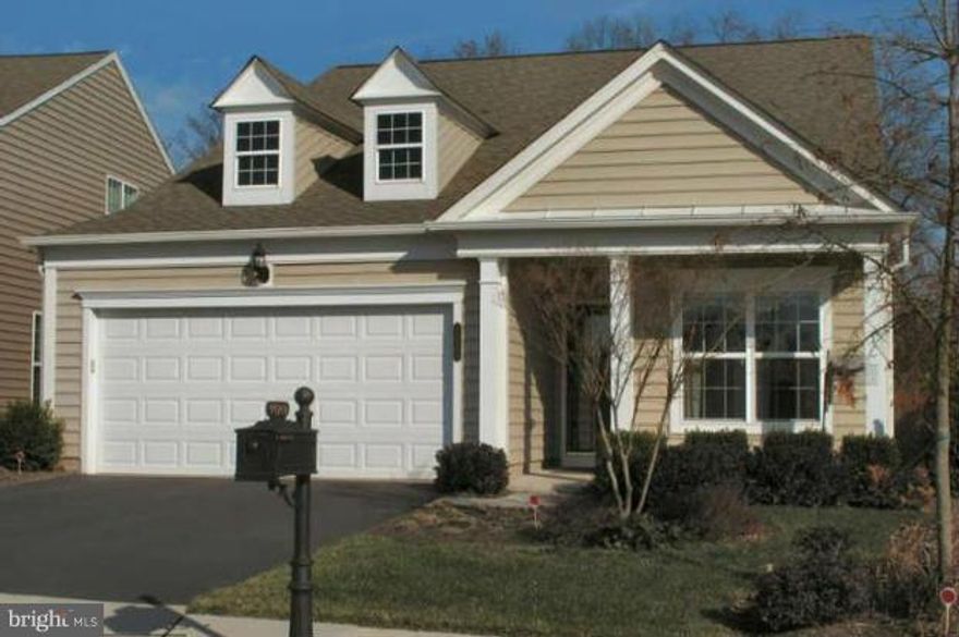 Beautiful, well maintained home on a premium lot in Potomac Green active adult community. Gourmet, upgraded kitchen w/SS appliances, granite counters. Upgraded hardwood flooring, fireplace, sunroom, private study, large loft/ 2nd floor (2nd master), private patio, elec. sunshade, custom planting around home. Premium lot backing to trees & woods w/ large grass common area in front of the home.