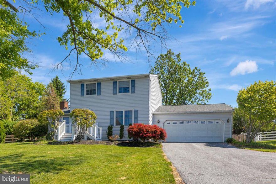 Warm and inviting 3BR/2.5BA Colonial built in 1985 and nestled on a .64-acre lot in the desirable Walnut Ridge community, located at the end of a quiet cul-de-sac. This home features a beautiful, fully fenced backyard and a low-maintenance deck designed for effortless entertaining, privacy, and everyday enjoyment. Just minutes from downtown Westminster’s shopping, dining, entertainment, and local events, the property offers approximately 2,300 sq. ft. of living space with thoughtful updates including 50-year architectural shingles installed in 2024 with a transferable warranty, fresh paint throughout many rooms, brand-new carpet, and a one-year home warranty for added peace of mind. Interior highlights include updated bathrooms, replacement windows, crown molding, a skylight, newly installed smoke alarms, and a warm wood-burning fireplace in the family room. The lower level offers a spacious finished living and entertaining area with a full bathroom, providing excellent space for guests, recreation, or flexible use. Flooring throughout includes LVP, ceramic tile, Pergo, and carpet. The spacious two-car garage provides ample storage and convenience. A large shed enhances outdoor storage and functionality. All appliances convey, including the washer and dryer. Conveniently located near schools, hospital and medical facilities, Sandymount Park, the Ag Center, and with easy access to Rt. 140, I-795, Baltimore, Hanover, and Frederick. Some photos may include virtual staging.