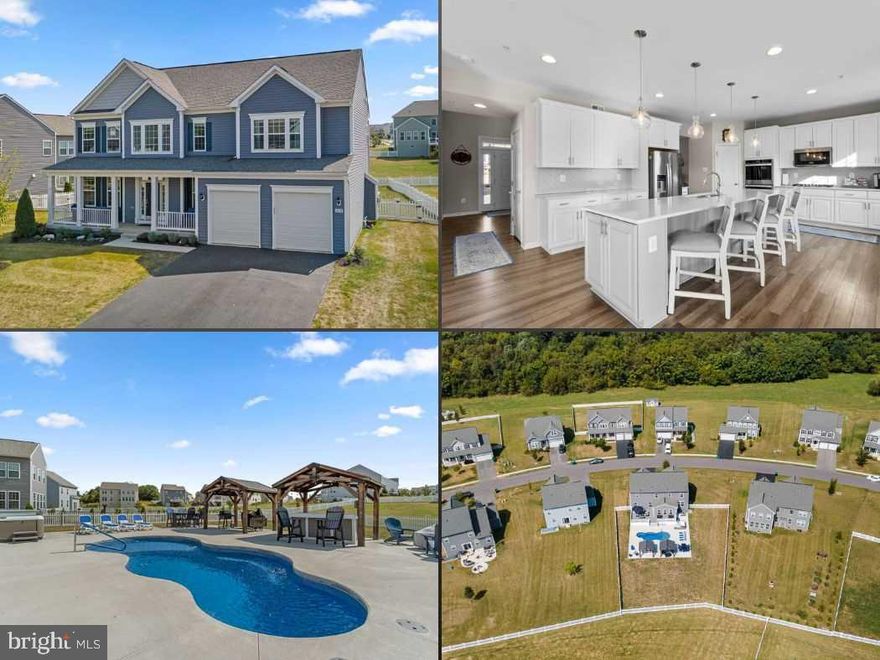 The sellers have recently made a significant price adjustment, offering an even better opportunity to make your dream home a reality. The PRIDE  of ownership is evident in this property,as the homeowners have maintained it with exceptional care.This gorgeous 4,676 total square feet offers 4 bedrooms,3.5 baths in sought-after Westfields and has so much to offer.From the moment you arrive, you’re welcomed by the home’s impressive curb appeal, front porch, a spacious two-car garage with ample parking, and a fenced resort-style backyard that truly sets this property apart.Step inside to a breathtaking two-story foyer featuring a striking oak open iron balusters staircase and a beautiful view of the formal dining room. Natural light fills every corner of this home and the kitchen and morning room are no exception. The kitchen boasts a 12 ft. QUARTZ eat-at island, 4 glass pendant lights, a large pantry,propane cooktop, upgraded quartz countertops, subway tiles with a herringbone-pattern backsplash, smart internet-connected built-in microwave and double wall ovens and abundant upgraded cabinetry, including 42" upper cabinets—perfect for the cooking enthusiast.The spacious family room offers a cozy propane fireplace, ideal for relaxing evenings. Seeking tranquility? Step outside to the incredible backyard oasis. Enjoy a large TREX deck, a privacy partition, a 14' x 30' inground pool with the depth of 4'6" to 6'. The Latham Axiom 14  Fiberglass Laminate Construction upgraded to a  saltwater POOL, with a tanning ledge and seating areas, remote to control for the lights, handrail, POOL cover, BULLFROG hot tub with SPA COVER LIFT, two pavilions, a custom bar, and a seasonal custom bar cover—everything you need for outdoor living at its finest.Upstairs, you'll find three generous secondary bedrooms with walk in closets and the full primary suite. The primary features two large walk-in closets and an en-suite bath with dual vanities, a soaking tub, ample storage, and a walk-in shower.And there’s more—this home also includes a full finished basement with continued partial natural light across the recreation and great room, plentiful storage, and a full bath.  Main level was upgraded to add the morning room with a 2' rear extension.The garage door opener is compatible with an app. All custom blinds installed are cordless. The property features numerous builder upgrades and enhanced exterior amenities. The sellers have thoughtfully considered all aspects of the home. After exploring the home, be sure to tour the community amenities, including the pool and pool house, tot lots, trails, tennis courts, and basketball courts.Research the school ratings from Niche and Great Schools for both public and private schools in the area, representing superior and solid scores. NO CITY TAX!