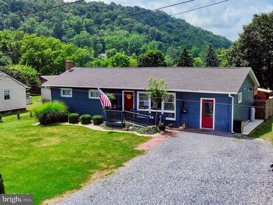 Charming Ranch Home Just Minutes from Downtown Bedford! Discover the perfect blend of comfort, convenience, and character in this beautifully maintained 3-bedroom, 2-bath ranch-style home located just outside of downtown Bedford, PA. Featuring hardwood and ceramic tile floors throughout, this home offers stylish, easy-care living from top to bottom. The main level boasts a spacious living room that flows effortlessly into the dining area and the new kitchen—added in 2020 with modern finishes. Just off the dining room, you'll find a generous pantry/laundry room for added convenience. Two comfortable bedrooms and a remodeled full bath complete the main floor. Downstairs, the finished basement offers even more living space with a third bedroom, game room, and a second full bath featuring a large, tiled walk-in shower with built-in seating. There's also abundant storage throughout. Step outside and enjoy your own private oasis—complete with a large fenced-in backyard, a covered porch with a wood oven, workshop, shed with attached chicken coop, and an edible garden featuring grapes, apples, raspberries, blackberries, and herbs. Additional highlights include: New roof (2020) Handicap-accessible front and rear entrances Propane generator Heat pump with central air Wood burner in basement 11'6' X 12'3' Work Shop This unique property offers peaceful living with the convenience of town just minutes away. Schedule your private showing today!
