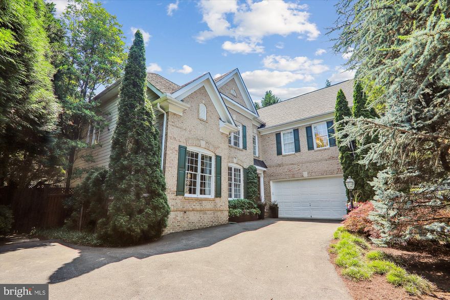 Nestled off Spruce Tree Ave, this beautiful home, built in 2002, offers 4 bedrooms, 3.5 bathrooms, and a two-car garage and is located just moments from vibrant downtown Bethesda.

Step inside to a picturesque two-story foyer adorned with elegant wainscotting, pillars, and crown molding, setting the tone for the sophisticated design found throughout the home. Gleaming wood floors lead you to a spacious formal dining room bathed in natural light from oversized windows, perfect for hosting memorable dinners.

The heart of the home is the island kitchen, featuring stunning cherry cabinets, stainless steel appliances, and a convenient eat-in island with a sink. The adjoining breakfast area offers a cozy spot for casual meals, while the nearby formal family room provides a warm and inviting space to gather, complete with a fireplace. 

For those working from home, the main-level office/den is a dream come true, featuring custom-built floor-to-ceiling cabinetry and a dedicated desk, all accessible through elegant French double doors.

The private primary suite is a luxurious retreat, boasting a coffered ceiling and a double-sided fireplace that separates the bedroom from a serene sitting room. The spacious primary bathroom includes double vanities, a spa tub, and a tiled stand-up shower, offering a spa-like experience. Three additional bedrooms and two full bathrooms complete the second level, providing ample space for family or guests. 

The unfinished lower level is a blank canvas, ready for your creative ideas.
Outside, enjoy the beautifully landscaped rear yard, featuring a pergola, deck, and a serene waterfall pond. This tranquil oasis is perfect for outdoor entertaining or simply relaxing.

Take advantage of the nearby Bethesda-Chevy Chase YMCA, with its pool and fitness options, or explore the scenic biking and running paths of the Bethesda Trolley Trail. With easy access to NIH, medical centers, Maplewood/Alta Vista Local Park, and the diverse shopping and dining experiences of downtown Bethesda, convenience is at your doorstep.

Don’t miss this exceptional opportunity to own a stunning home in a prime location. Schedule your appointment today to see this beautiful property. Act fast – homes in this area don’t stay on the market for long!