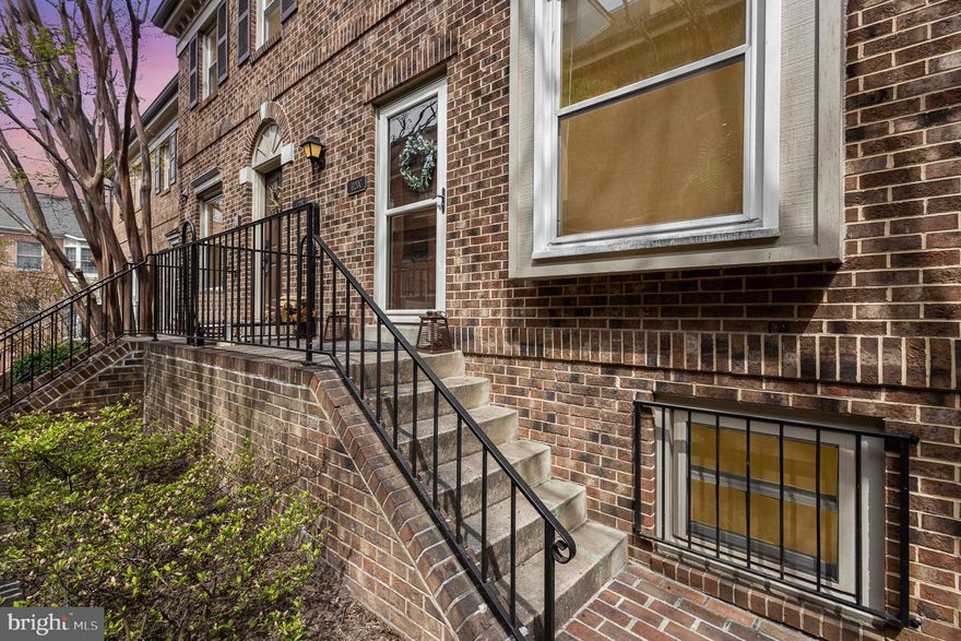 **OFFER DEADLINE: Monday, April 28th by 12pm** Welcome to this beautifully maintained 3-level condo-owned townhouse in the heart of Ballston! This bright and open home features hardwood floors throughout the main and upper level, stainless steel appliances in the kitchen, woodburning fireplace in the living room opening up to the dining area, 2 primary suites on the upper level, and sunfilled 3rd level with private balcony. Assigned parking space included + street parking permits available. Updates include:  (2025) Brand new HVAC. (2021) Window glass replacement, new washer & dryer, new carpet on 3rd level. (2020) New roof and composite deck. (2019) New stainless steel kitchen appliances.  (2017) New 50 gallon water heater. (2013) New kitchen cabinets, hardwood floors, windows, light fixtures, front door, skylights, and balcony doors.  Excellent location with easy Ballston metro station, Ballston mall, shopping, dining, and so much more!