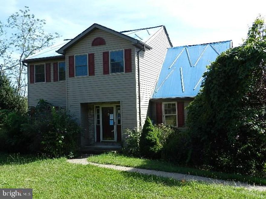 Spacious four bedroom home on .74 acres. Walkout basement with large Rec Room and gas log fireplace. 1st floor family room. Eat-in kitchen with oak raised panel cabinets, pantry closet and door to deck. Master Bedroom with Vaulted Ceiling.