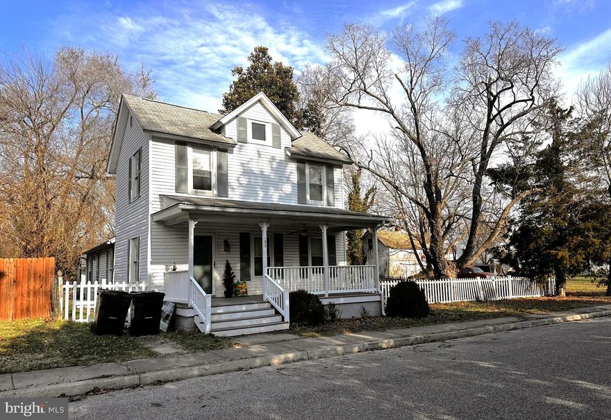 Classic Charm Meets In-Town Living. Enjoy the luxury of space on this generous .34-acre lot, featuring a 3-bedroom home designed for both quiet mornings on the front porch and lively backyard BBQs. Inside, flow seamlessly from the bright & airy living room to the dining area and kitchen. With three full baths, a dedicated laundry room, and a storage-ready basement, the layout is as functional as it is inviting. The expansive, tree-shaded yard is a private oasis for pets and play.  Significantly updated in 2005 and now ready for your finishing touches—bring your fresh paint and flooring ideas to unlock instant equity! Some images have been virtually staged for illustrative purposes only