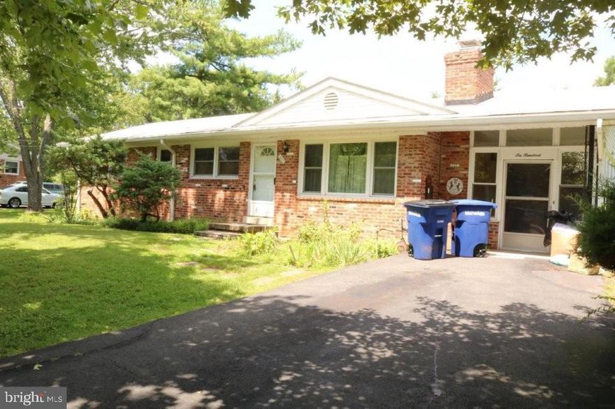 This quaint single family home  in the heart of downtown Herndon can be your new home!  Rarely available for rent, this cozy rambler with hardwood flooring on main level provides a great space to call home.   Living room boasts a wood burning fireplace. Separate dining room and spacious kitchen with ample storage. Large sunroom addition w/ access to the driveway. Main level features 2 bedrooms with 2 full baths. Walk out lower level with wood burning fireplace, tons of storage, laundry room, den/3rd bedroom and full bath. Kitchen counter will be replaced asap. Home will have walls and ceilings on upper level and stairway to basement  painted asap.