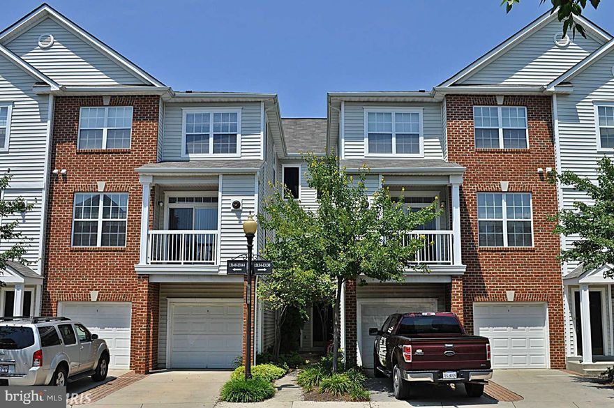 Immaculate townhouse style condo, in excellent community with first class amenities. Shows like a model home. Updates throughout include:  granite countertops, new carpet, paint, ceramic tile in kitchen/baths, light fixtures, bathroom vanities.  Double-pane oversized windows throughout - abundant natural light. Balcony off living room. Storage closet. NO GARAGE