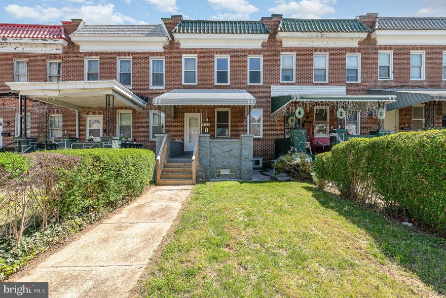 Welcome home to this charming 3-bedroom, 1.5-bath porch-front rowhome nestled on a quiet street in the West Forest Park neighborhood. Step inside, through the foyer, to find a fresh white kitchen featuring stainless steel appliances, quartz countertops, and a modern layout that flows into the dining and living rooms—all accented by stylish gray LVT flooring. A convenient half bath completes the main level.

Upstairs, you’ll find three freshly painted bedrooms with brand-new neutral carpet and a full bath. One bedroom offers a cute balcony overlooking the rear yard. The finished lower level offers a flexible rec room, dedicated office space, storage room, and a laundry area with washer and dryer included.

Enjoy the privacy of a fully fenced rear yard—perfect for relaxing, entertaining or even just a place for your favorite dog to run. Located just minutes from public transportation, major highways, downtown Baltimore, and Forest Park Golf Course, this home blends comfort, convenience, and value. Schedule your showing today!