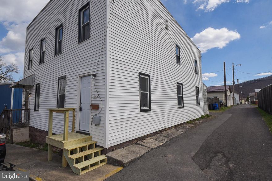 Great investment opportunity in the heart of Keyser.  Left side (15 A) is occupied/rented by long term tenant.  Right side (17A) was just recently remodeled and is shown in the photos.