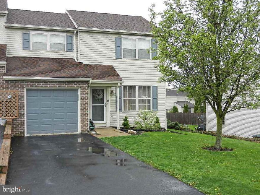 Home has 24x11 addition on the rear leading to deck & nice yard.  Updated KIT w/ cabinets added & updated counter tops.  Huge MSTR suite w/ walk-in closet.  Attached GAR round out this end-unit.  BA w/ tub & separate shower.