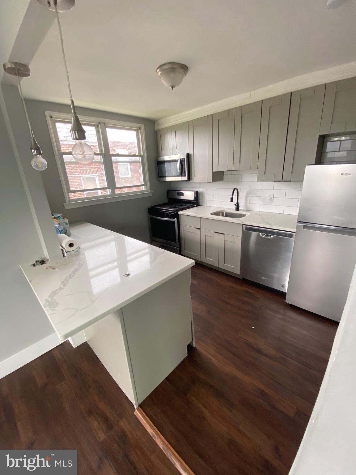 Welcome to 1321 E Johnson Street, Unit 2—a beautifully updated second-floor apartment offering 2 spacious bedrooms and 1 modern bathroom. This home features gleaming hardwood floors throughout, a freshly renovated interior, and plenty of natural light to create a warm, inviting atmosphere. Residents will also enjoy garage access with laundry hookups, providing added convenience and extra storage options. Located in Philadelphia’s East Mount Airy neighborhood, this home is close to local shops, restaurants, schools, and public transportation, making your commute and daily errands simple and stress-free.