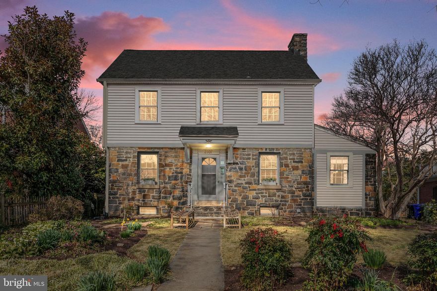 Welcome to this beautiful 1940 Colonial, a distinguished residence located on the coveted Key Boulevard in Lyon Village. This classic colonial home boasts timeless charm and modern convenience, offering a seamless blend of traditional architecture and contemporary updates. With five bedrooms all conveniently situated on one level and four and a half bathrooms and a spacious, open-concept main level, this home provides a comfortable and functional living space for a variety of lifestyles.

As you enter, you are greeted by the elegance of a bygone era with the hand stacked stone hearth and the foyer leading to well-appointed living spaces. The heart of the home is the expansive addition on the back, featuring an open floor plan that seamlessly integrates the kitchen, dining, and living areas. This bright and airy space is ideal for both casual family gatherings and entertaining guests.

The gourmet kitchen is a chef's delight, equipped with high-end appliances, ample counter space, and custom cabinetry. The adjacent dining area with a wall of custom built-ins with inset cabinetry is perfect for enjoying meals with family and friends, while the living area invites relaxation with its wood burning fireplace and inviting atmosphere.

The home’s layout ensures privacy and convenience, with all 5 bedrooms thoughtfully arranged on a single level. The master suite with cathedral ceilings is a sanctuary of comfort, offering a spacious retreat with an ensuite bathroom, providing a perfect balance of luxury and functionality. The additional bedrooms provide versatile spaces, suitable for bedrooms, home offices, or guest rooms.

The 4.5 bathrooms throughout the home feature tasteful finishes and modern amenities, ensuring both style and practicality. The attention to detail is evident in every corner, reflecting a commitment to quality and craftsmanship.

A lower level with windows offers a recreation room with custom built-ins, laundry, full bathroom, and storage. And the walk-up attic is great for storage or could be finished for additional living space.

Outside, the property is complemented by a well-manicured yard and a deck, providing opportunities for outdoor enjoyment and relaxation. The large custom storage shed backs to a parking pad and alley. The location in Lyon Village places you in a highly sought-after neighborhood with convenient access to Clarendon’s, Metro, restaurants, shops, parks, and the vibrant energy of the surrounding community.