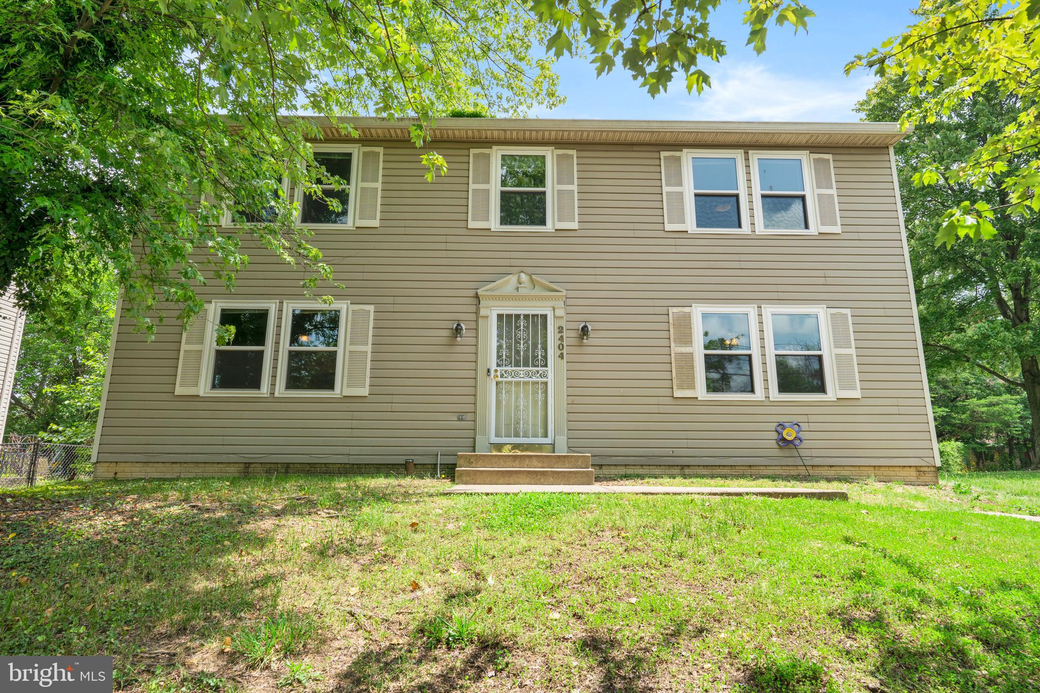 Welcome to 2404 Old Brooks Drive, a spacious, move-in ready single-family home offering the perfect blend of comfort, space, and convenience. Tucked away on a quiet, tree-lined street, this 4-bedroom, 2.5-bathroom home sits on a generous lot with plenty of room to entertain, garden, or simply enjoy the outdoors. From the moment you step inside, you’ll notice the bright, open layout designed to accommodate everyday living and special gatherings alike.
The main level features large, sun-filled living spaces and a functional kitchen with ample counter space, ideal for family meals or hosting friends. Upstairs, the primary suite offers a peaceful retreat with its own en-suite bath, while three additional bedrooms provide flexibility for guests, a home office, or a growing household. With over 1,800 square feet of living space and a thoughtfully designed floor plan, you’ll have all the room you need without sacrificing warmth or charm.
Located in the heart of Hillcrest Heights, this home is just minutes from shopping, dining, parks, and major commuter routes. Whether you’re heading into DC or staying local, you’ll love the convenience of this central location without the burden of HOA fees. Don’t miss your chance to own a home that checks every box. Schedule your tour today and experience it for yourself.