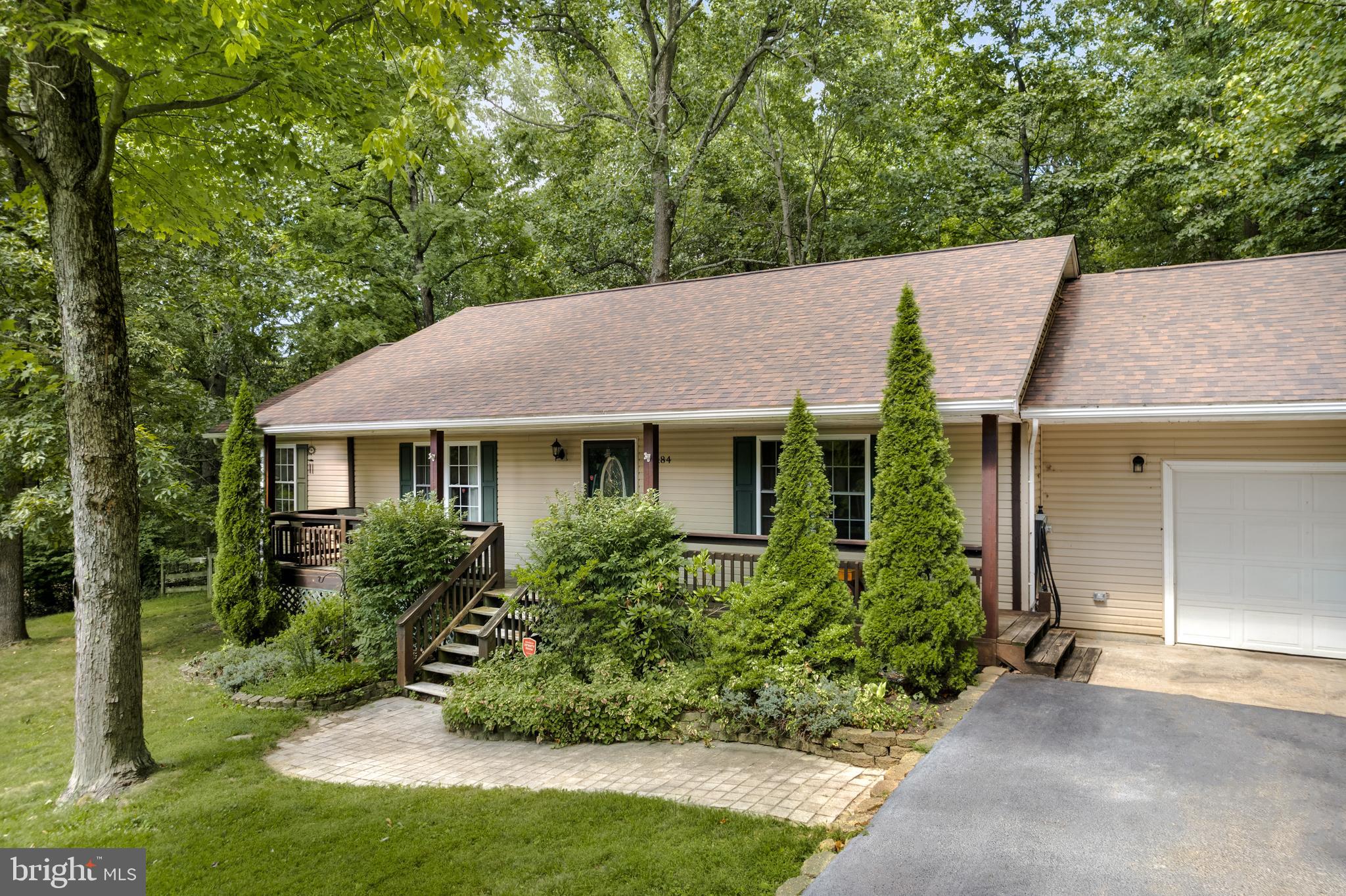 Privacy, Deeded River Access to the Shenandoah River and a great location.. what more could you want!.
Welcome home to 184 McGuire Circle. A spacious 1 Level living home offering modern conveniences while being immersed in nature. Upon walking in the home, you will enter your welcoming foyer, and be greeted by large family. Enjoy cooking and entertaining in your Stunning Kitchen with granite countertops, abundance of cabinets and built in nook and dining space. Primary Suite offers views of your backyard, a walk-in closet, and an adjoining private full bathroom. The addition guest rooms are spacious w/ ceiling fans. Large guest bathroom with double sinks and tubshower combo . The property also offers a large over sized attached garage a fenced in yard spacious covered porch. Back deck. Patio with fire pit area. Plus a bonus to this property is half of it is in Shannondale so you have an additional access point! Enjoy being minutes from Mountain Lake Club and Lake, your deeded river access, hiking trails and more. Great location being conveniently located near major routes, and amenities! Welcome home!