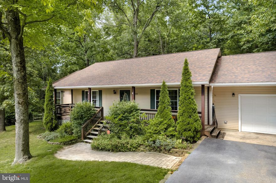 Privacy, Deeded River Access to the Shenandoah River and a great location.. what more could you want!.
Welcome home to 184 McGuire Circle. A spacious 1 Level living home offering modern conveniences while being immersed in nature. Upon walking in the home, you will enter your welcoming foyer, and be greeted by  large family. Enjoy cooking and entertaining in your Stunning Kitchen with granite countertops, abundance of cabinets and built in nook and dining space.  Primary Suite offers views of your backyard, a walk-in closet, and an adjoining private full bathroom. The addition guest rooms are spacious w/ ceiling fans. Large guest bathroom with double sinks and tubshower combo . The property also offers a large over sized attached garage a fenced in yard spacious covered porch. Back deck. Patio with fire pit area. Plus a bonus to this property is half of it is in Shannondale so you have an additional access point!  Enjoy being minutes from Mountain Lake Club and Lake, your deeded river access, hiking trails and more. Great location being conveniently located near major routes, and amenities!  Welcome home!