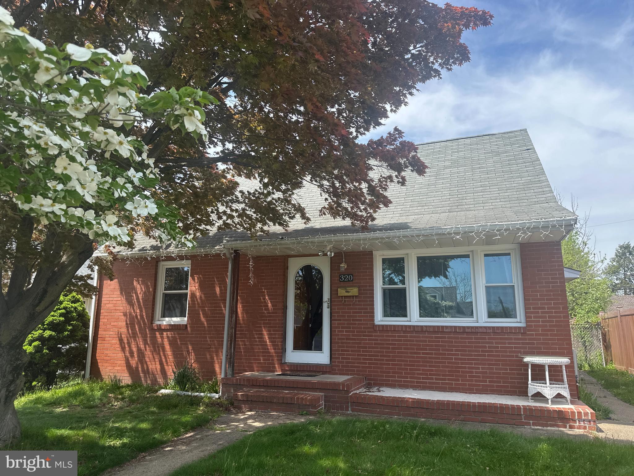This charming, spacious single-family rental home at 320 Barclay Avenue offers a welcoming blend of character, comfort, and functionality. Located on a quiet street in a well-established neighborhood, this 4-bedroom, 2-bathroom home features gleaming hardwood floors throughout and a versatile layout perfect for a variety of lifestyles. The main level boasts a bright living room space that leads into a warm, eat-in kitchen—ideal for both everyday meals and entertaining guests. Two generously sized bedrooms and a full bathroom are located on the first floor, providing easy access and flexible living options. Upstairs, you’ll find two additional bedrooms that can be used for family, guests, or a home office. A highlight of the home is the full, partially finished walk-out basement, offering excellent bonus space for a family room, fitness area, or storage. The basement also includes a second full bathroom and a laundry area, adding convenience and functionality. Step outside into a fully fenced-in backyard and covered patio—perfect for outdoor gatherings, playtime, or simply enjoying your own private retreat. The property also features off-street parking, enhancing everyday ease. Situated close to shopping, dining, and major routes, this home delivers both peace and practicality. Don't miss your chance to call this beautifully maintained home your own.