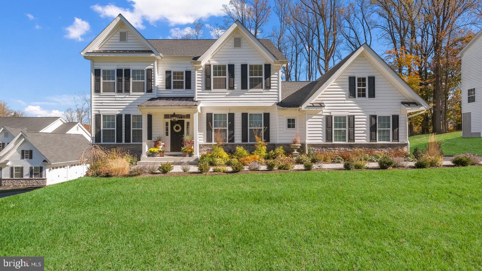 Welcome home to 5 Miller Way located in a secluded enclave of 15 luxury homes! Enjoy all of the appeal of New Construction in the Award Winning Garnet Valley School District without the hassle or wait! This 2 year New, Dilworthtown Model boasts 4 Bedrooms, 2 ½ Bathrooms and is ideally situated on a private cul-de-sac. Make your way up the front walkway and into the warm & inviting Foyer. Immediately you will notice the Neutral Design is suitable to any style. To the left is the convenient First Floor Home Office and to the right is a Powder Bath and Mudroom w/ Access to the 2-Car Garage. Allow your eye to trail from the Rich Hardwoods into the Open Floor Plan Family Room, Kitchen & Dining Room. This space is truly an entertainer’s dream - from the seamlessly flowing Great Room and Kitchen, to the elegant finishes - you will find this to be the perfect place for gathering during the holidays, unwinding on the weekends and celebrating all of life’s special occasions with friends & family! The Gourmet Kitchen features a well-appointed 4-Seat Center Island, Granite Countertops, Modern White Shaker Cabinets, Pantry and Gorgeous Stainless Appliances, including Double Oven & Gas Cooktop. Enjoy the convenience of the Dining Area just steps away, overlooking the tree-lined Backyard. The Family Room, flooded with Natural Light from the Sliders, features a cozy Fireplace, an added comfort for the winter months to come. The 2nd Floor is just as impressive. To the left and right of the stair landing are two beautiful, generously sized Bedrooms, each complete with ample Closets. Enjoy the added luxury of the 2nd Floor Laundry Room, just steps away from each of the 4 Bedrooms, making laundry a breeze! The 3rd Bedroom, currently utilized as an upscale Home Office, is located at the end of the hall and flooded with Natural Light. Finally, make your way into the tranquil Primary Suite - a truly relaxing oasis after a long day - complete with 2 Spacious Walk-In Closets and a Serene Primary Bathroom with Walk-In Shower and Double Vanity. The Walk-Out Basement awards plenty of desirable storage and can easily be finished in the future to add another full level of entertainment space. Enjoy evenings on the new Trex Deck grilling and relaxing or down around the Paver Patio perfect for gathering around a firepit with friends! This backyard has been meticulously maintained and landscaped, leaving you nothing to do but enjoy the beautiful blooms to come. Located minutes to Restaurants & Shopping including Downtown Media,Trader Joes, Whole Foods, Wegmans, Target, Costco, Delaware Shops and much more! Hiking, Biking & Walking at Ridley Creek State Park and Chester Creek Trails with easy access to Philadelphia, Wilmington, DE, NJ, PHL Airport and all major routes. Schedule your appointment today before it's too late! This home is not one to miss!