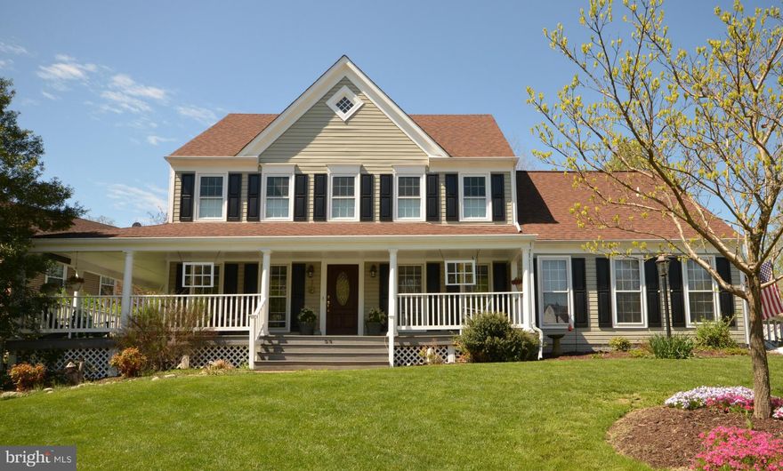 Charming home with large wrap-around front porch on a beautifully landscaped yard.  Light filled, updated gourmet kitchen with SS appliances opens to family room.  Enjoy hardwood floors and office with built-ins on main.  Master bedroom boasts vaulted ceiling, numerous closets and updated master bathroom.  Fully finished basement with BONUS rooms and full bathroom.  Convenient to Routes 7/28/267.