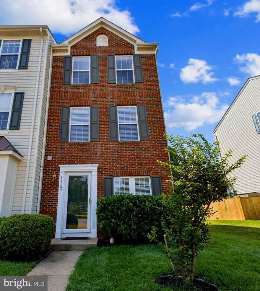 OPEN HOUSES CANCELED. Nestled in the charming Ashburn Village, this delightful end-of-row townhouse offers a perfect blend of comfort and style. With 1,648 square feet of thoughtfully designed living space, this home features 3 spacious bedrooms, 2 1/2  bathrooms.  large kitchen, living room and family room with a gas fireplace, perfect for those chilly evenings.  Enter the home into a  large living room with pretty floors.  There is also a half bath on this level.  The kitchen boasts of ample table space, complemented by modern appliances, making meal prep a breeze. Enjoy leisurely breakfasts in the bright breakfast area, or step outside to the lovely brick patio, where you can unwind amidst the serene views of trees and open spaces.  The view off of the patio is quite beautiful with landscaping, trees and an occasional deer or fox.   One level up is a family room with gas fireplace overlooking the beautiful park like area.  This level also has a spacious bedroom and a bath with walk in shower.  The middle and upper 2 floors have beautiful  Brazilian Birchwood floors that are not even 2 years old.  The third floor has 2 bedrooms, sharing an amazing jack and jill bath with both a soaking tub and shower plus 2 sinks!  The roof was replaced in 2017 and the HVAC in 2013.  The entire home has been painted in a beautiful neutral color.  Outside, the community amenities are a true bonus. Enjoy access to 4 refreshing outdoor pools, an inside pool, tennis and pickleball courts , a recreational center with gym facility, basketball courts, children's play area and the gorgeous lakes for canoeing, paddle boarding or fishing.  This corner lot backs to trees and open common areas, providing a peaceful backdrop for your daily life. With assigned parking for two vehicles and a welcoming community atmosphere, this townhouse is not just a house; it’s a place to call home. Experience the perfect blend of comfort, convenience, and community in this lovely Ashburn Village residence.