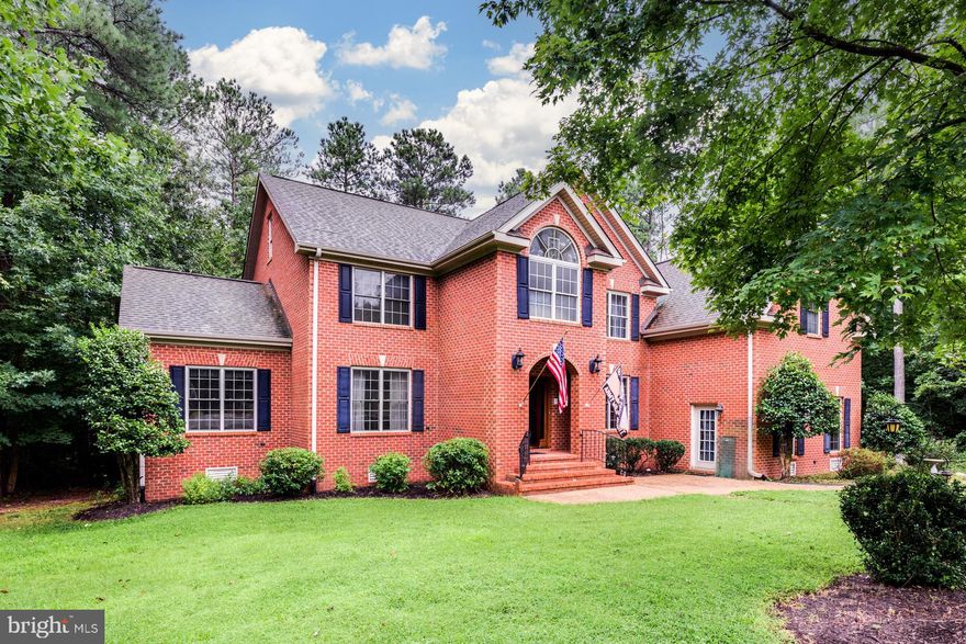 WOW!!! 3 Levels. 6,300 sqft! 17 Rooms! Solid Brick Transitional in Brickshire is situated on a 1.14-acre cul-de-sac lot. This former Parade of Homes model features 4 bedrooms, 5 full baths and 2 half baths! It even has a home theatre, wine cellar, sunroom, card room and game room. Extensive wide crown molding and chair rail. Stunning foyer with marble flooring and iron & brass banister with graduated staircase. The sunken Great Room has a soaring ceiling, hardwood floors, gas fireplace and abundant views of nature! Formal Dining and Living rooms. Fabulous gourmet Kitchen features a massive island, granite countertops, cherry cabinets, stainless appliances, double ovens, double dishwashers and 2 walk-in pantries! The possible in-law suite has a separate entry or can even be an office/game room or recreational room. There is also a Sunroom with access to the deck. Delightful card room with wet bar and fireplace. Spacious home office. Upstairs is the Primary Bedroom with a romantic fireplace, cathedral ceiling, 2 walk-in closets and en-suite bath. 2 other bedrooms up with en-suite baths.