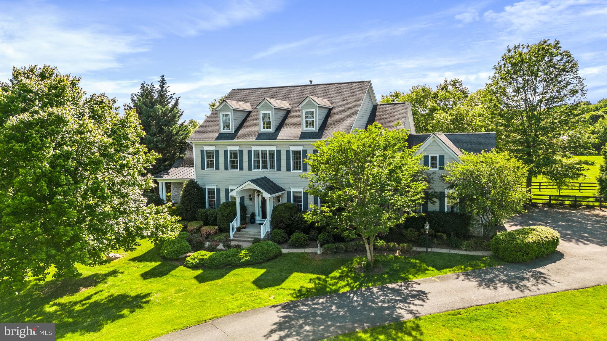 Agents, offers deadline is on Monday, July 1st at 5:00 PM., Please, go to the document section for the instructions on writing your client's offer. Thank you.
====================================
Escape to your own private oasis! This exceptional home is perfectly sited on a beautiful 3.32 acres in the sought after Heather Knolls community. Built with space for everyone, this home has everything you need to make memories. The Devonshire model boasts 10' ceilings on the main level and beautiful hardwood floors throughout the main and upper levels. The welcoming foyer is flanked by formal living and dining rooms on either side, a private home office with access to both charming porch and a screened-in porch. The expansive kitchen boasts a huge island, a walk-in pantry, a butler’s pantry and an adjacent large breakfast area with floor to ceiling windows overlooking stunning yard. The family room has a fireplace and an adjoining sun-room with windows on 3 sides leading to deck with dual staircases. Finishing off the main level, you’ll find a 3-car garage and a mudroom with its private entrance. The upper level showcases a massive owner’s retreat with private sitting area, luxury bath and a huge walk-in closet. You'll also find a laundry room and three additional bedrooms, two with an adjoining bath and one with en-suite bath. The lower level was designed with entertaining in mind! The Irish inspired bar opens to the recreation area and conservatory with glass doors leading to a picture perfect yard. Flexible ambient to have a media room, a game room, a gym and a dart area. You will also find a charming second home office with built-ins, a den, a full bath and plenty of storage. Walking out of the lower level there are an outdoor hot tub, a built-in fire pit, a whole house backup generator, and a large covered storage area. All this and more, just minutes to shopping & the W&OD trail.