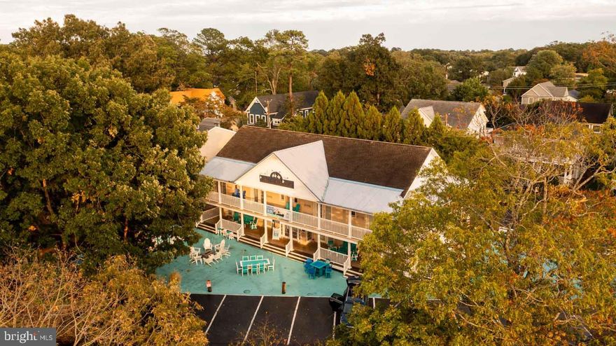 Nestled in the heart of downtown Rehoboth Beach, Canalside Inn epitomizes the perfect blend of historic charm and modern comfort. Originally established in 1960 and meticulously revitalized from 2022-2024, this award-winning boutique hotel boasts 13 uniquely styled rooms and suites, each adorned with chic beach-inspired decor.

Prime Location:
Recognized with the prestigious Best of Delaware award for four consecutive years, Canalside Inn enjoys a coveted position just steps from the Rehoboth-Lewes Canal and a short walk or bike ride to the beach and boardwalk.

Luxurious Accommodations:
Ideal for gatherings of all sizes, Canalside Inn features versatile indoor and outdoor event spaces, including a 650 sq ft indoor center and over 3200 sq ft of outdoor areas with stunning canal views. Highlights include a swimming pool, hot tub, bicycles, beach chairs, and umbrellas, complemented by a cozy guest lounge complete with a kitchen and dining area.

Perfect for Memorable Events:
From intimate gatherings to corporate retreats, Canalside Inn offers everything needed for unforgettable events, including an event bus for added convenience. Embrace the coastal lifestyle with outdoor social areas featuring games and fire pits.

Invest in Rehoboth Beach's Hospitality Scene:
Canalside Inn presents a unique opportunity to own a piece of Rehoboth Beach's thriving hospitality scene. Contact us today to schedule a private tour and discover the potential of acquiring this prestigious property.
Experience the allure of Canalside Inn firsthand and envision how it can be your next venture or dream investment in the heart of Rehoboth Beach.