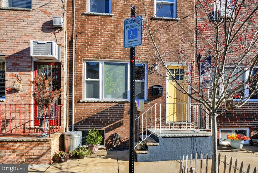 Just listed! This well‑maintained and cheerful Passyunk Square / Dickinson Narrows townhouse sits on a fabulous wide, low‑traffic block, offering a charming façade and excellent curb appeal. Step into the welcoming first‑floor entryway and into a spacious straight‑through layout featuring a combined living and dining room. The living area includes a ceiling fan, hardwood flooring, and recessed lighting, creating a warm and comfortable ambiance throughout the main level. The updated kitchen provides generous space for both prep and dining, complete with upper and lower wood cabinetry, granite countertops, a gas cooking range, and stainless-steel appliances.  Additional feature instant hot water tank at the kitchen sink.  An east‑facing kitchen window overlooks the private rear patio, and a rear door leads directly to the backyard—perfect for BBQs, outdoor dining, and entertaining.
The full basement offers high ceilings and includes an authentic vintage wine press; an unexpected feature filled with charm and potential. Upstairs, the second floor features three comfortable bedrooms and a well‑kept three‑piece full bath—ideal for today’s flexible work‑from‑home needs.
Located just one block from the legendary Termini Brothers Bakery and a short stroll from the renowned restaurants, cafés, and everyday conveniences of Passyunk Square, this home boasts unbeatable walkability. With parking permitted on only one side of the block, ample on‑street parking is typically available. Public transportation is conveniently close, with a bus stop at the corner providing easy access to Washington Square, Independence Hall, Center City, the stadiums, and FDR Park.
Additional perks include walking distance to a local fitness center. With a Walk Score of 96—truly a Walker’s Paradise—this low‑maintenance home combines charm, convenience, and an incredibly desirable location!