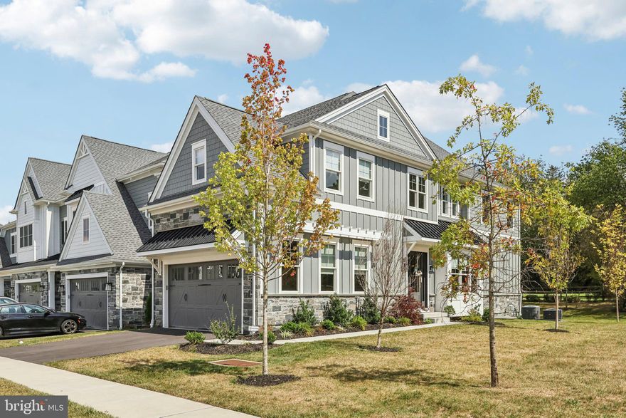 Experience the perfect blend of modern luxury and timeless design at Ironstone at Blue Bell.  Welcome to 6170 Argos Dr, situated on one of the best lots in this exclusive community by award-winning Foxlane Homes. This newly built residence showcases exceptional craftsmanship, high-end finishes, and thoughtful upgrades throughout. This stunning end unit home sits next to community open space and backs up to an 84 acre property offering one of the most serene settings you can find. Over $100,000 spent by the owner on post closing designer finish upgrades throughout the home.  ​

​​A grand two-story foyer greets you with wide-plank hardwood floors, custom millwork, and an elegant chandelier that sets the stage for the home’s elevated style. To the right, a sunlit dining room with a charming window seat offers the perfect setting for gatherings, complemented by a walk-in pantry. The chef’s kitchen is a true centerpiece, featuring an oversized custom island with seating and an impressive suite of professional appliances: a Wolf range with double ovens, paneled Sub-Zero refrigerator, built-in Miele coffee station, and custom cabinetry with glass-front details. The open concept great room enhances everyday living with a soaring tiled gas fireplace, bespoke built-ins, and sliding glass doors that extend to a private deck overlooking green open space.  A refined den/study with wainscoting and a dry bar with beverage refrigerator and wine storage offers perfect additional space for lounging or a home office. Additional conveniences on this level include a spacious laundry/utility room, powder room, oversized storage closet, and interior access to the two-car garage.

Upstairs, the primary suite serves as a private sanctuary with vaulted ceilings, a tailored walk-in closet with custom organization and washer/dryer, and a spa-like marble bath with dual vanities, a glass-enclosed shower, and private water closet. Two additional en-suite bedrooms, each with walk-in closets and upgraded baths, provide comfort and privacy. The finished lower level offers remarkable versatility, with a large recreation room (prepped for a wet bar) and a walk-in wine storage room. Around the corner is a second finished space that would make a perfect guest suite with full bath, ideal for overnight visitors or multi-generational living.

This home is set in a prime Blue Bell location just minutes from area highways and train stations.  Walk across the street to Phil's Tavern or one of the many trails offered by Wissahickon Valley Watershed Association. This home delivers unparalleled style, convenience, and livability in one of the region’s most sought-after communities. No reason to wait for new construction when you can move right into this refined home.